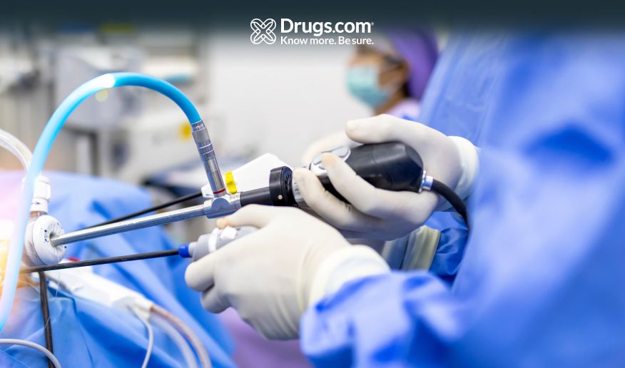 Doctor performing an endoscopic procedure inside an operating room in a hospital